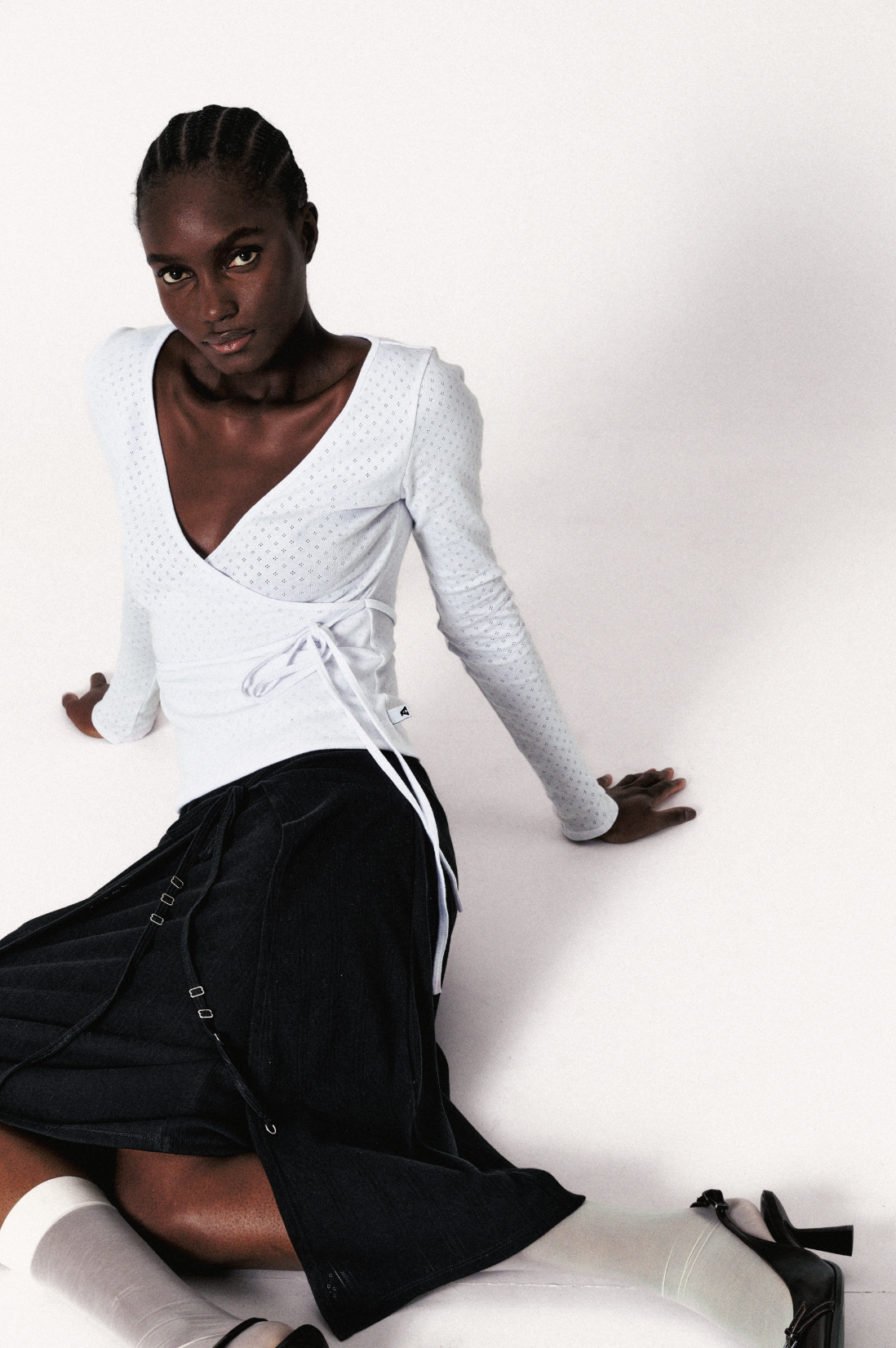 JUPE MI LONGUE EN POINTELLE DE COTON NOIRE